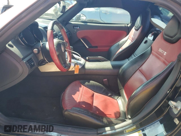 2008 Saturn Sky Red Line z VIN 1G8MF35X98Y119647, wystawiony jako Copart lot #75611924 z przebiegiem 54 121 mil mil oraz Szkody całkowita. Historia ofert i sprzedaży dostępna na DreamBid. Obrazek 7.