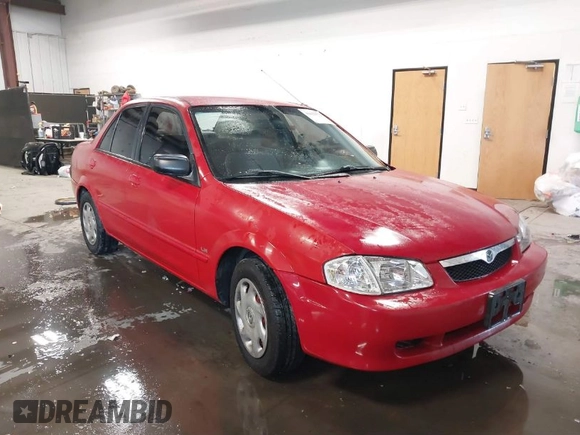 2000 Mazda Protege DX with VIN JM1BJ2220Y0258658, listed as a IAAI auction lot 41622579 with 276,682 mi miles and . Bid and sale history available at DreamBid. Image 1.