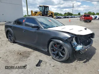 2015 Dodge Charger RT with VIN 2C3CDXCT9FH784672, listed as a Copart auction lot 58190615 with 121,033 mi miles and Salvage title. Bid and sale history available at DreamBid. Image 4.