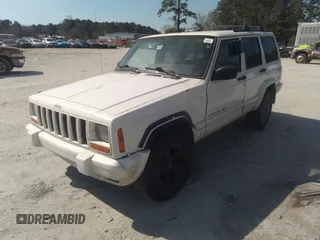 1999 Jeep Cherokee Sport with VIN 1J4FT68S1XL542270, listed as a IAAI auction lot 41665906 with 346,554 mi miles and . Bid and sale history available at DreamBid. Image 2.