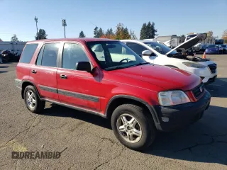 1999 Honda CR-V LX with VIN JHLRD2843XC014579, listed as a Copart auction lot 79394924 with 249,544 mi miles and Salvage Title. Bid and sale history available at carsss.com. Image 4.