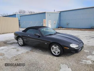 1997 Jaguar XK with VIN SAJGX2746VC006987, listed as a Copart auction lot 42871575 with 60,945 mi miles and Clean Title. Bid and sale history available at DreamBid. Image 1.