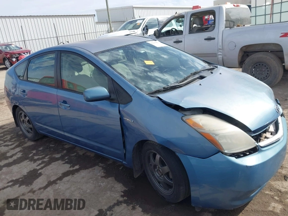 2007 Toyota Prius z VIN JTDKB20U677674057, wystawiony jako IAAI lot #41663525 z przebiegiem Nie podano mil oraz . Historia ofert i sprzedaży dostępna na DreamBid. Obrazek 13.