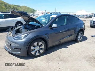 2023 Tesla Model Y Long Range z VIN 7SAYGDEE8PA191415, wystawiony jako IAAI lot #42155577 z przebiegiem 42 149 mil mil oraz . Historia ofert i sprzedaży dostępna na DreamBid. Obrazek 2.