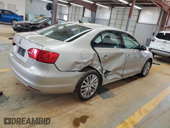 2014 Volkswagen Jetta TDI w/Premium with VIN 3VWLL7AJ9EM261908, listed as a Copart auction lot 60703205 with 128,892 mi miles and Salvage title. Bid and sale history available at DreamBid. Image 3.