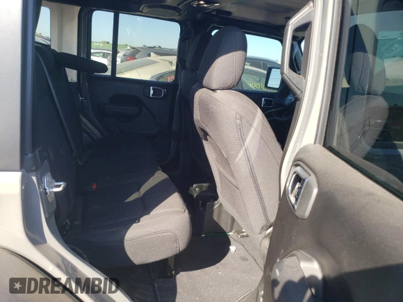 2023 Jeep Wrangler Sport with VIN 1C4HJXDN1PW701944, listed as a Copart auction lot 69973104 with 24,733 mi miles and Salvage Title. Bid and sale history available at DreamBid. Image 10.