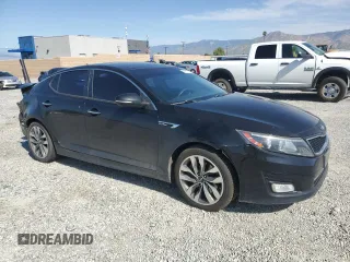 2015 Kia Optima SX Turbo with VIN 5XXGR4A6XFG454049, listed as a Copart auction lot 52217185 with 115,675 mi miles and Salvage Title. Bid and sale history available at carsss.com. Image 4.