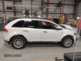 2011 Lincoln MKX with VIN 2LMDJ8JK8BBJ32602, listed as a IAAI auction lot 41967983 with 212,547 mi miles and . Bid and sale history available at carsss.com. Image 13.