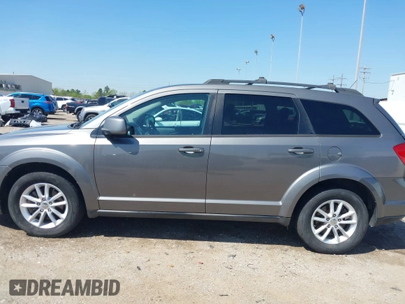 2013 Dodge Journey SXT with VIN 3C4PDDBGXDT650886, listed as a IAAI auction lot 41864331 with 224,579 mi miles and . Bid and sale history available at DreamBid. Image 14.