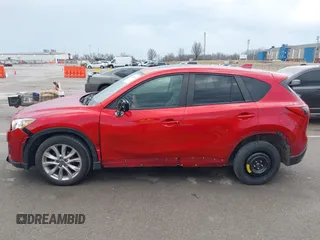 2015 Mazda CX-5 Grand Touring with VIN JM3KE4DY1F0540586, listed as a IAAI auction lot 41710216 with 148,800 mi miles. Bid and sale history available at carsss.com. Image 14.