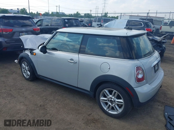 2011 MINI Hardtop with VIN WMWSU3C5XBT092450, listed as a IAAI auction lot 42409929 with 168,528 mi miles and . Bid and sale history available at DreamBid. Image 3.