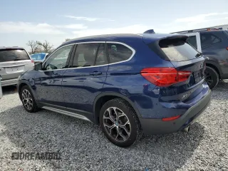 2020 BMW X1 xDrive28i with VIN WBXJG9C0XL5R33141, listed as a Copart auction lot 63040155 with 165,172 mi miles and Clean title. Bid and sale history available at DreamBid. Image 2.
