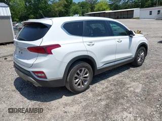 2019 Hyundai Santa Fe SE with VIN 5NMS23AD0KH013811, listed as a IAAI auction lot 42337926 with 87,000 mi miles and . Bid and sale history available at DreamBid. Image 4.