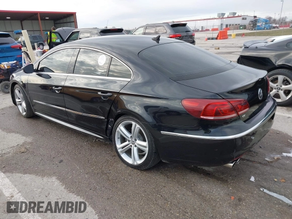 2014 Volkswagen CC R-Line with VIN WVWBN7ANXEE521055, listed as a IAAI auction lot 41197539 with 94,902 mi miles. Bid and sale history available at carsss.com. Image 3.