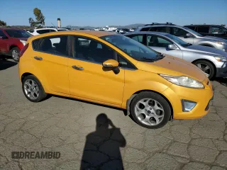2011 Ford Fiesta SES with VIN 3FADP4FJ6BM124655, listed as a Copart auction lot 42670165 with 112,008 mi miles and Salvage Title. Bid and sale history available at carsss.com. Image 4.