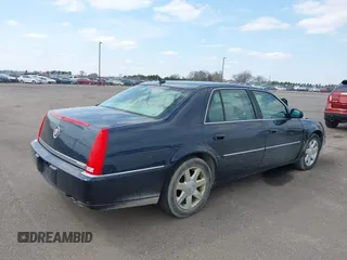 2006 Cadillac DTS w/1SC with VIN 1G6KD57Y26U103494, listed as a IAAI auction lot 42072696 with 85,675 mi miles. Bid and sale history available at carsss.com. Image 4.