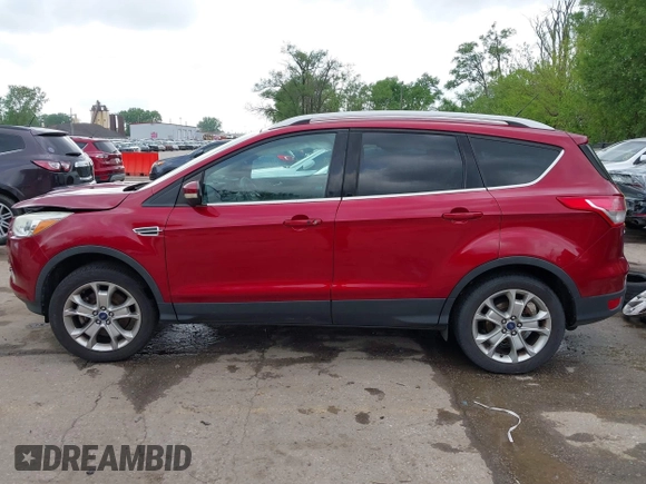 2016 Ford Escape Titanium with VIN 1FMCU9JX0GUA29353, listed as a IAAI auction lot 42133326 with 143,892 mi miles and . Bid and sale history available at DreamBid. Image 15.