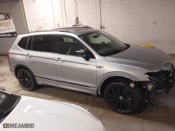 2021 Volkswagen Tiguan SE with VIN 3VV2B7AX1MM013884, listed as a IAAI auction lot 41313293 with 40,489 mi miles. Bid and sale history available at carsss.com. Image 14.