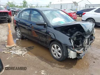 2006 Hyundai Accent GLS z VIN KMHCN46C76U038040, wystawiony jako IAAI lot #42220455 z przebiegiem 140 413 mil mil oraz . Historia ofert i sprzedaży dostępna na DreamBid. Obrazek 1.