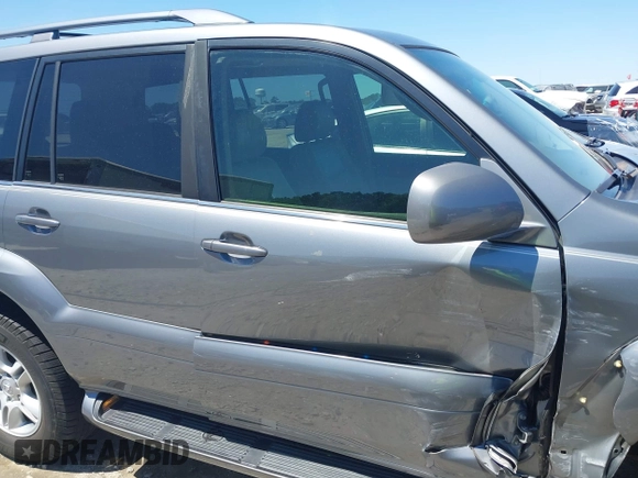 2006 Lexus GX 470 z VIN JTJBT20XX60123321, wystawiony jako IAAI lot #42123307 z przebiegiem 203 340 mil mil oraz . Historia ofert i sprzedaży dostępna na DreamBid. Obrazek 17.