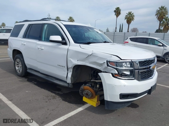 2016 Chevrolet Tahoe LS with VIN 1GNSCAKC1GR139869, listed as a IAAI auction lot 41642073 with 128,380 mi miles. Bid and sale history available at carsss.com. Image 1.