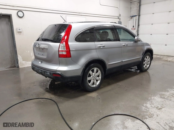 2007 Honda CR-V EX-L with VIN JHLRE38717C066399, listed as a IAAI auction lot 41854827 with 113,281 mi miles. Bid and sale history available at carsss.com. Image 4.