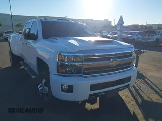 2018 Chevrolet Silverado 3500HD High Country with VIN 1GC4K1EY6JF207068, listed as a IAAI auction lot 41288394 with 110,158 mi miles and . Bid and sale history available at DreamBid. Image 14.