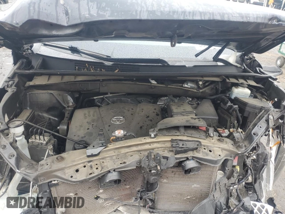 2019 Toyota Highlander LE z VIN 5TDBZRFH4KS701267, wystawiony jako Copart lot #58402555 z przebiegiem 107 147 mil mil oraz Szkoda całkowita • Salvage title. Historia ofert i sprzedaży dostępna na DreamBid. Obrazek 12.