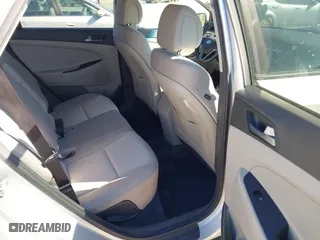 2016 Hyundai Tucson Sport with VIN KM8J33A25GU224084, listed as a IAAI auction lot 41827851 with 153,348 mi miles. Bid and sale history available at carsss.com. Image 8.