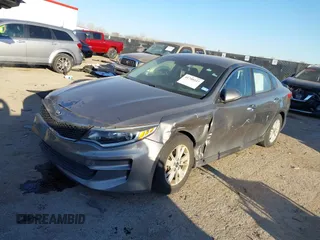 2016 Kia Optima LX with VIN 5XXGT4L39GG102599, listed as a IAAI auction lot 41748147 with 104,712 mi miles. Bid and sale history available at carsss.com. Image 2.
