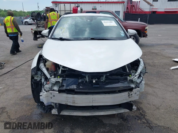 2019 Toyota C-HR XLE z VIN NMTKHMBX9KR095031, wystawiony jako IAAI lot #42191087 z przebiegiem 102 167 mil mil oraz . Historia ofert i sprzedaży dostępna na DreamBid. Obrazek 13.