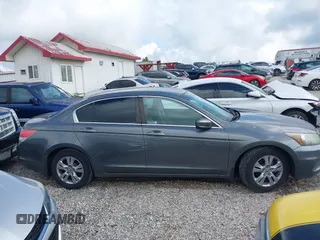 2012 Honda Accord LX Premium z VIN 1HGCP2F42CA104505, wystawiony jako IAAI lot #42520563 z przebiegiem 281 476 mil mil oraz . Historia ofert i sprzedaży dostępna na DreamBid. Obrazek 13.