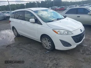 2012 Mazda 5 Sport z VIN JM1CW2BL2C0109739, wystawiony jako IAAI lot #42822536 z przebiegiem 145 446 mil mil oraz . Historia ofert i sprzedaży dostępna na DreamBid. Obrazek 1.