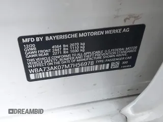 2021 BMW 2 Series 228i xDrive with VIN WBA73AK07M7H56978, listed as a IAAI auction lot 41215710 with 77,965 mi miles and . Bid and sale history available at DreamBid. Image 8.