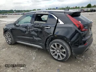 2019 Cadillac XT4 FWD Premium Luxury z VIN 1GYFZCR49KF147242, wystawiony jako Copart lot #55483215 z przebiegiem 94 990 mil mil oraz Szkody całkowita. Historia ofert i sprzedaży dostępna na DreamBid. Obrazek 2.