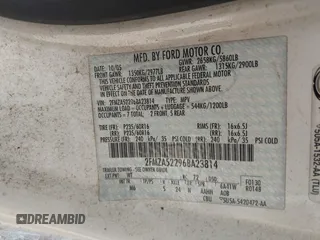 2006 Ford Freestar SEL z VIN 2FMZA52296BA23814, wystawiony jako IAAI lot #41791434 z przebiegiem 132 850 mil mil oraz . Historia ofert i sprzedaży dostępna na DreamBid. Obrazek 9.