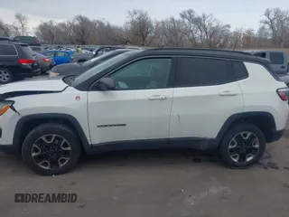 2018 Jeep Compass Trailhawk with VIN 3C4NJDDB9JT174899, listed as a IAAI auction lot 41635784 with 124,656 mi miles and . Bid and sale history available at DreamBid. Image 13.