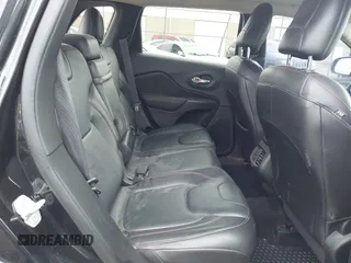2015 Jeep Cherokee Trailhawk with VIN 1C4PJMBS5FW647601, listed as a IAAI auction lot 42437734 with 170,640 mi miles and . Bid and sale history available at DreamBid. Image 8.