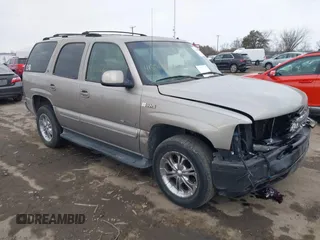 2002 Chevrolet Tahoe LS z VIN 1GNEC13Z82R242330, wystawiony jako IAAI lot #41396686 z przebiegiem 335 138 mil mil oraz . Historia ofert i sprzedaży dostępna na DreamBid. Obrazek 1.
