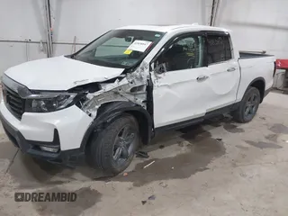 2022 Honda Ridgeline RTL-E z VIN 5FPYK3F76NB033832, wystawiony jako IAAI lot #41838047 z przebiegiem 16 497 mil mil oraz . Historia ofert i sprzedaży dostępna na DreamBid. Obrazek 2.