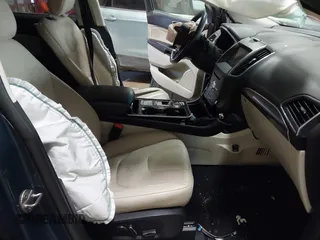 2019 Ford Edge Titanium with VIN 2FMPK4K93KBB01364, listed as a IAAI auction lot 41286263 with 134,588 mi miles. Bid and sale history available at carsss.com. Image 5.