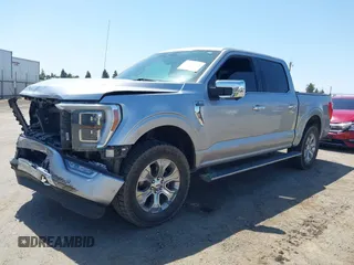 2021 Ford F-150 XL with VIN 1FTFW1E81MFA28258, listed as a IAAI auction lot 42402411 with 119,492 mi miles and . Bid and sale history available at DreamBid. Image 14.