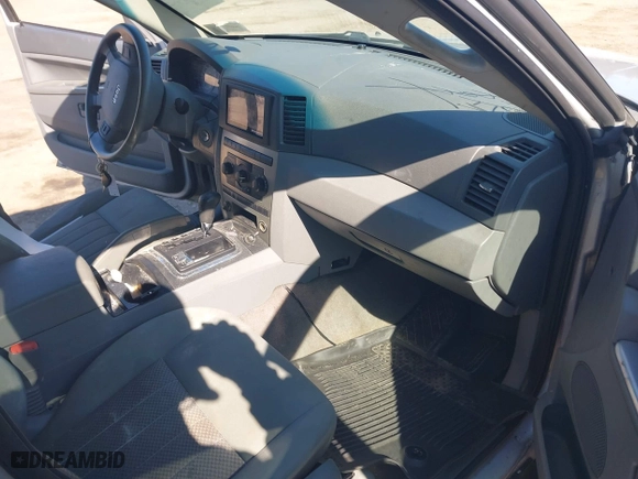 2005 Jeep Grand Cherokee Laredo with VIN 1J4HR48N65C595873, listed as a IAAI auction lot 41715998 with 145,689 mi miles. Bid and sale history available at carsss.com. Image 5.