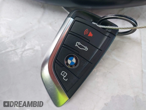 2022 BMW 4 Series M440i with VIN WBA53AT02NCJ20674, listed as a IAAI auction lot 41200398 with 28,235 mi miles and . Bid and sale history available at DreamBid. Image 11.