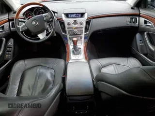 2012 Cadillac CTS Luxury with VIN 1G6DG5E54C0158220, listed as a Copart auction lot 58929735 with 107,667 mi miles and Salvage title. Bid and sale history available at DreamBid. Image 8.