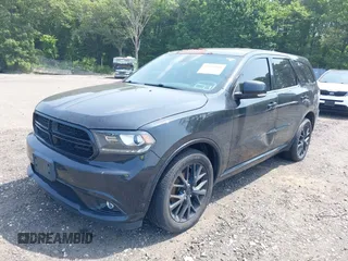 2015 Dodge Durango Limited with VIN 1C4RDJDG6FC917301, listed as a IAAI auction lot 42559104 with 263,499 mi miles and . Bid and sale history available at DreamBid. Image 6.