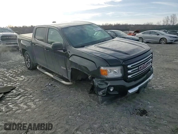 2015 GMC Canyon 4WD SLE with VIN 1GTG6BE34F1165547, listed as a Copart auction lot 43930715 with 124,970 mi miles and Salvage Title. Bid and sale history available at carsss.com. Image 11.