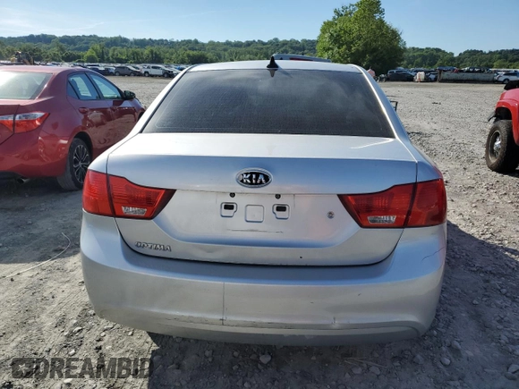 2010 Kia Optima LX z VIN KNAGG4A85A5407416, wystawiony jako Copart lot #71970634 z przebiegiem 194 869 mil mil oraz Szkoda całkowita • Salvage title. Historia ofert i sprzedaży dostępna na DreamBid. Obrazek 6.