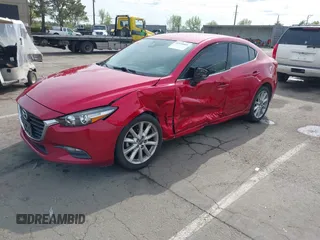 2017 Mazda 3 Touring with VIN 3MZBN1V79HM129043, listed as a IAAI auction lot 41970009 with 142,654 mi miles and . Bid and sale history available at DreamBid. Image 21.