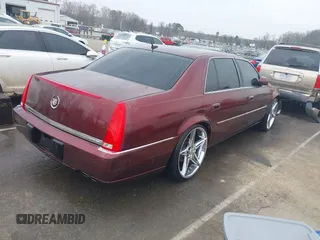 2007 Cadillac DTS Luxury I z VIN 1G6KD57Y07U142067, wystawiony jako IAAI lot #41797850 z przebiegiem 179 639 mil mil oraz . Historia ofert i sprzedaży dostępna na DreamBid. Obrazek 4.